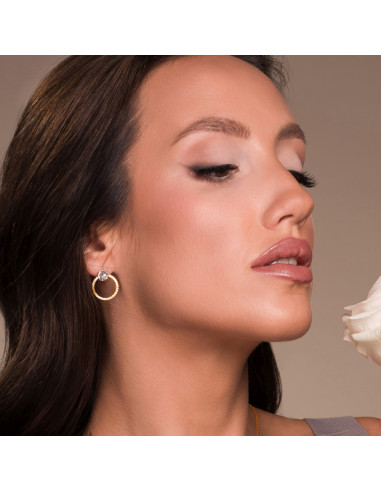 Close-up of STARDUST SPARK earrings with white Swarovski® crystals worn by model